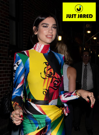 Dua Lipa wearing Spinelli Kilcollin rings as she performs on ‘ The Late Show with Stephen Colbert’ as a special musical guest on justjared.com.